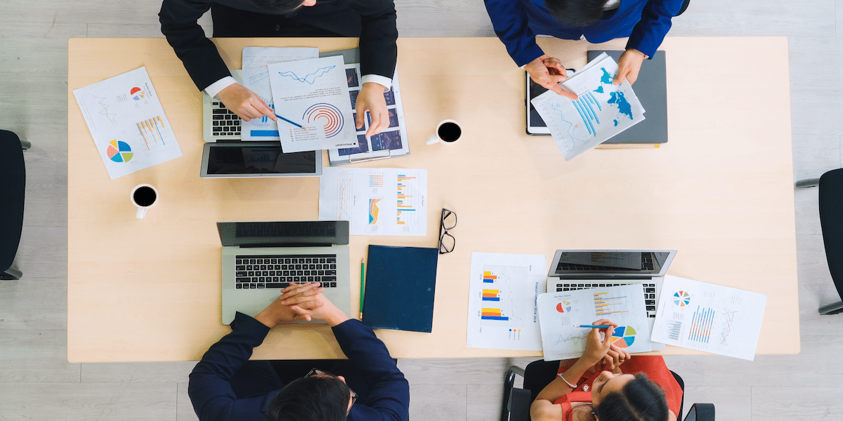 Image commercially licensed from https://unsplash.com/photos/business-people-group-meeting-shot-from-top-view-in-office-profession-businesswomen-businessmen-and-office-workers-working-in-team-conference-with-project-planning-document-on-meeting-table-SwcwogANktE