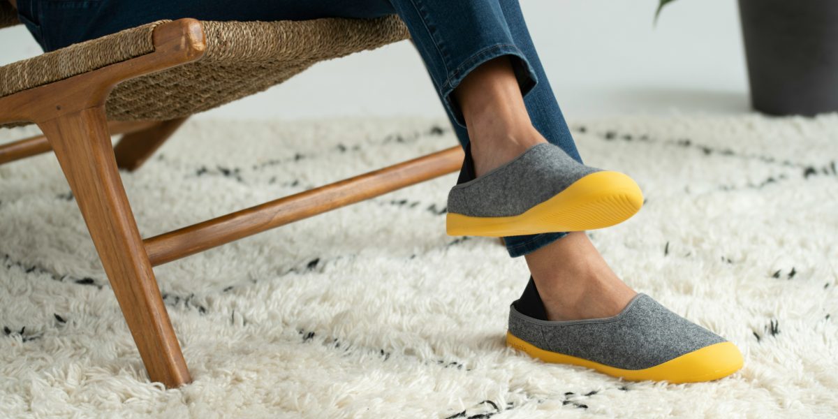Image commercially licensed from https://unsplash.com/photos/person-in-blue-denim-jeans-and-yellow-slip-on-shoes-sitting-on-brown-wooden-chair-on-on-on-on-on-eYE5Sj-eDsE